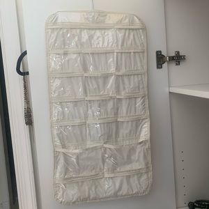 Closet Jewelry Organizer Hanger with miscellaneous jewelry